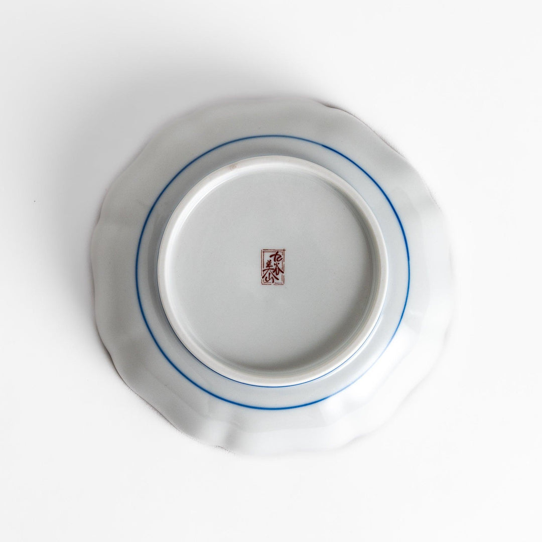 Cereal Bowl featuring a vibrant bird perched on blossoming sakura flowers, framed by intricate blue patterns.