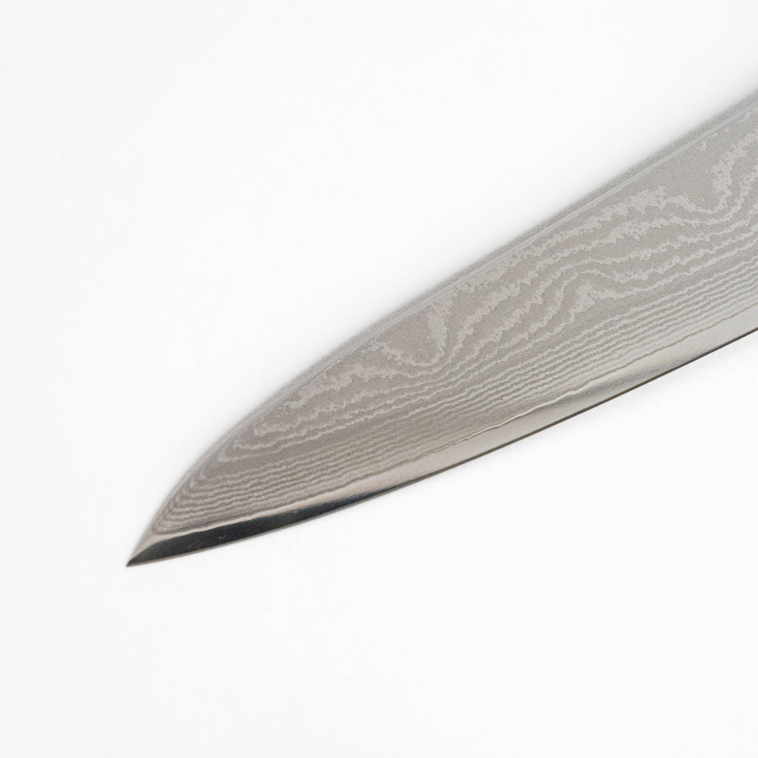 Handcrafted wooden tongs with a smooth surface and angled tips, perfect for stylishly serving or handling food.