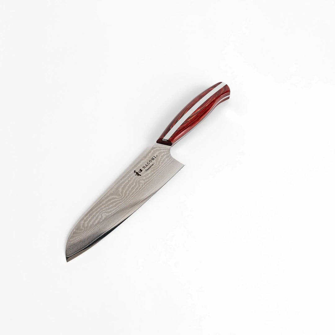Japanese Damascus steel Santoku knife with patterned blade and polished red wood handle crafted by Nagomi Japan.