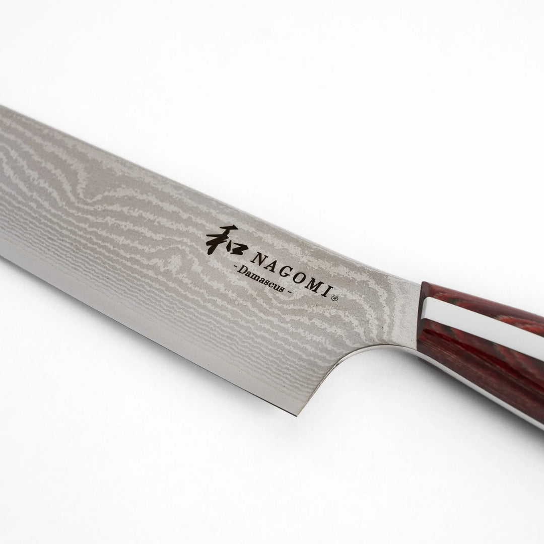 Japanese Damascus steel Santoku knife with patterned blade and polished red wood handle crafted by Nagomi Japan.