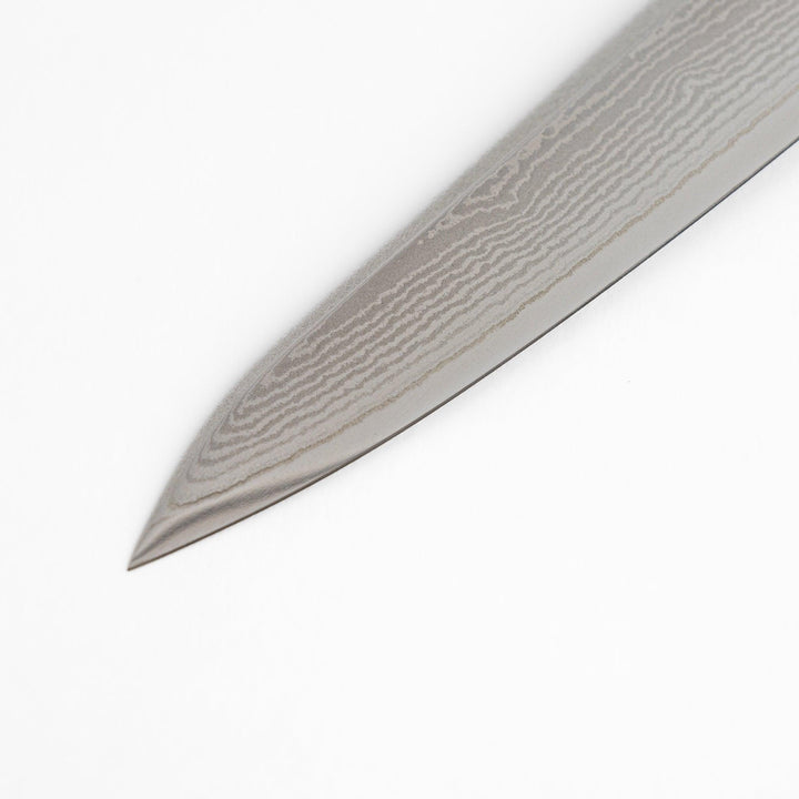 Nagomi Damascus utility knife with patterned blade and striped wooden handle offering precise everyday cutting.