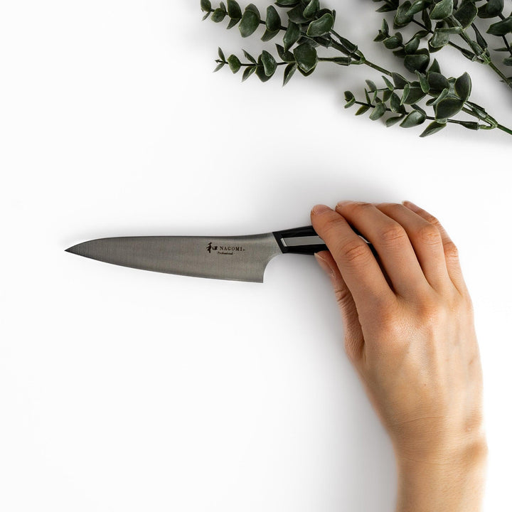 Nagomi Professional utility knife with sleek sharp blade and modern striped handle for precise comfortable kitchen work.