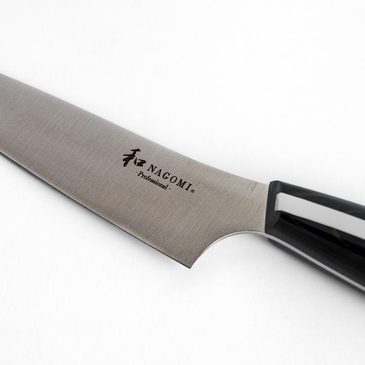 Nagomi Professional utility knife with sleek sharp blade and modern striped handle for precise comfortable kitchen work.