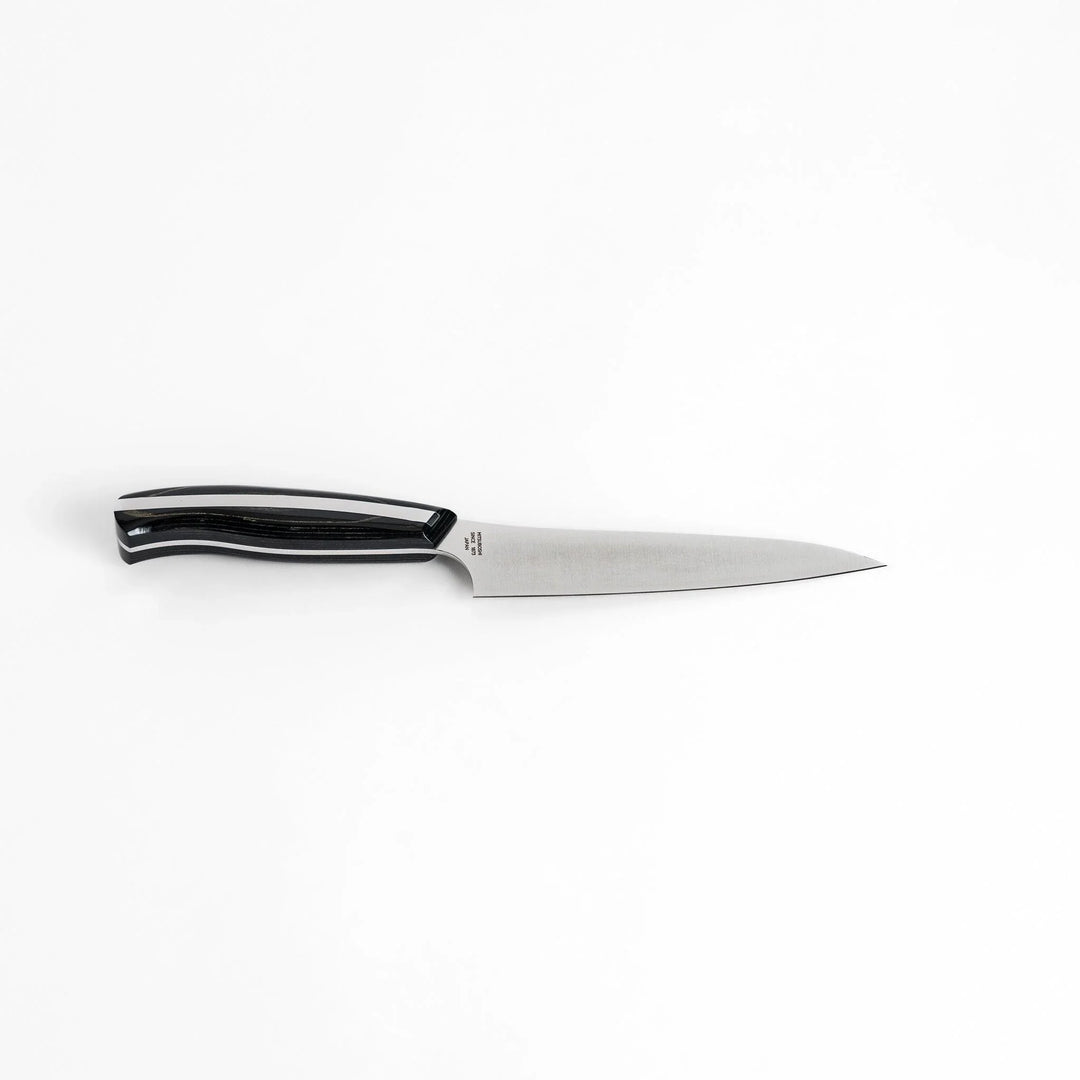Nagomi Professional utility knife with sleek sharp blade and modern striped handle for precise comfortable kitchen work.