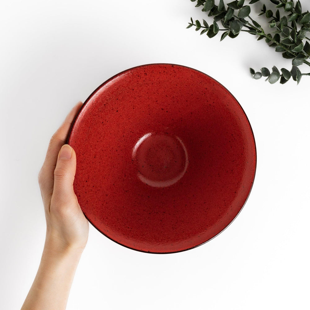 Red ramen bowl with a glossy lacquered finish, featuring subtle concentric ridges and a sturdy base for easy handling.