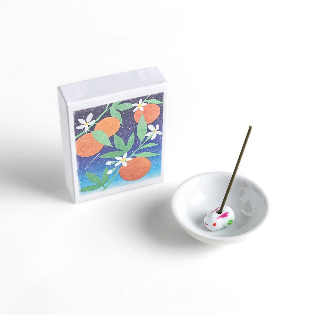 Incense with natural sticks in neroli and orange flower box offering a citrusy refreshing fragrance experience.