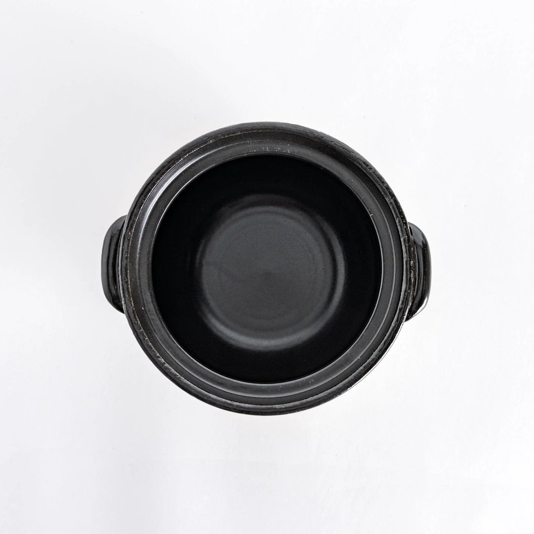 Donabe photographed from above without the lid, highlighting the spacious interior.