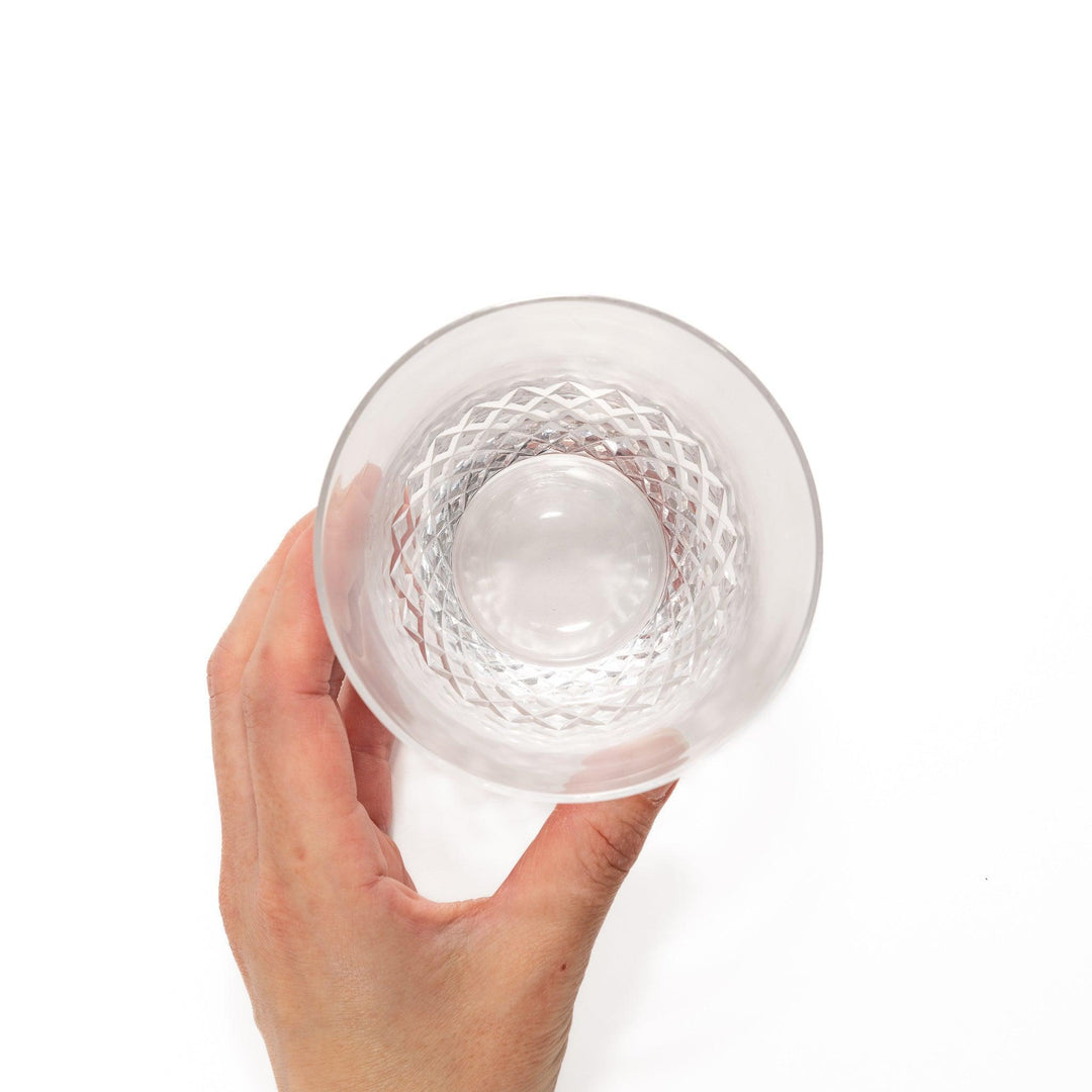 Nostalgia rocks glass with diamond-cut lower half, ideal for whiskey, cocktails, or everyday beverages.