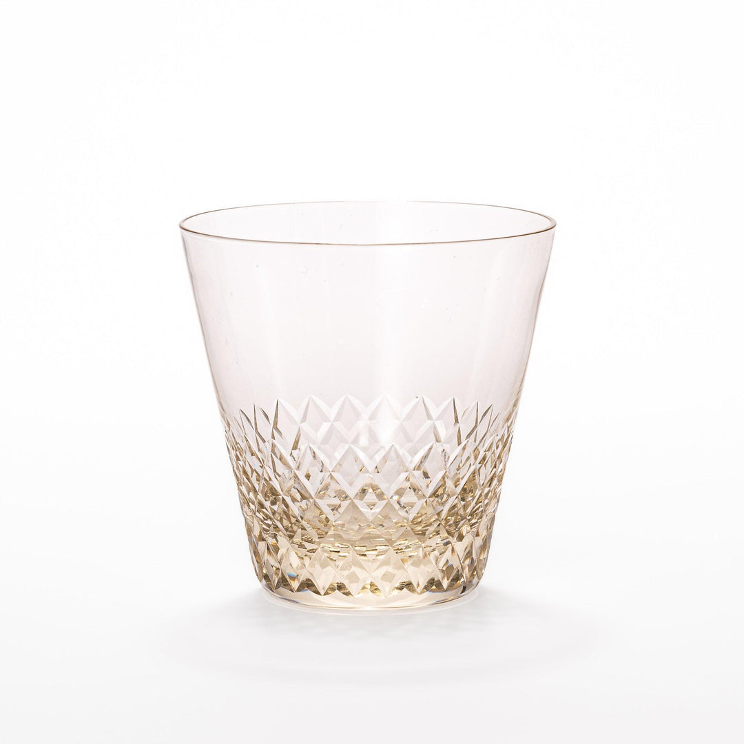 Amber nostalgia rocks glass with diamond-cut base and tapered shape, ideal for whisky, cocktails, or stylish everyday drinks.