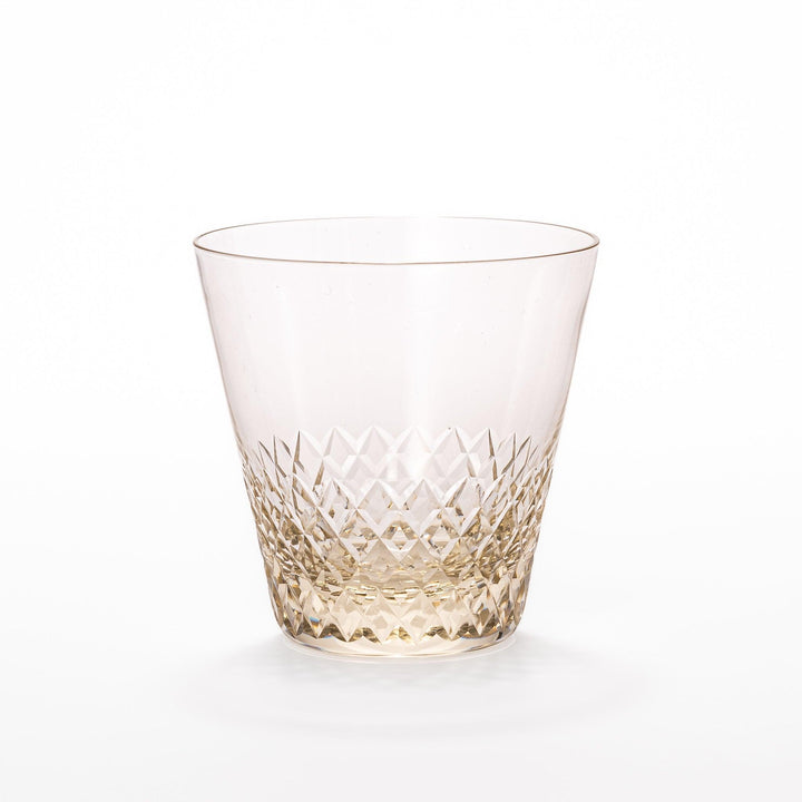 Amber nostalgia rocks glass with diamond-cut base and tapered shape, ideal for whisky, cocktails, or stylish everyday drinks.