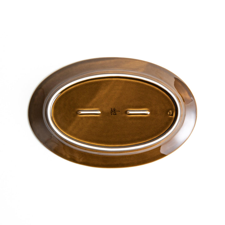 Sleek, dark brown or olive colored oval dinner plate with a glossy finish, simple and minimalist.