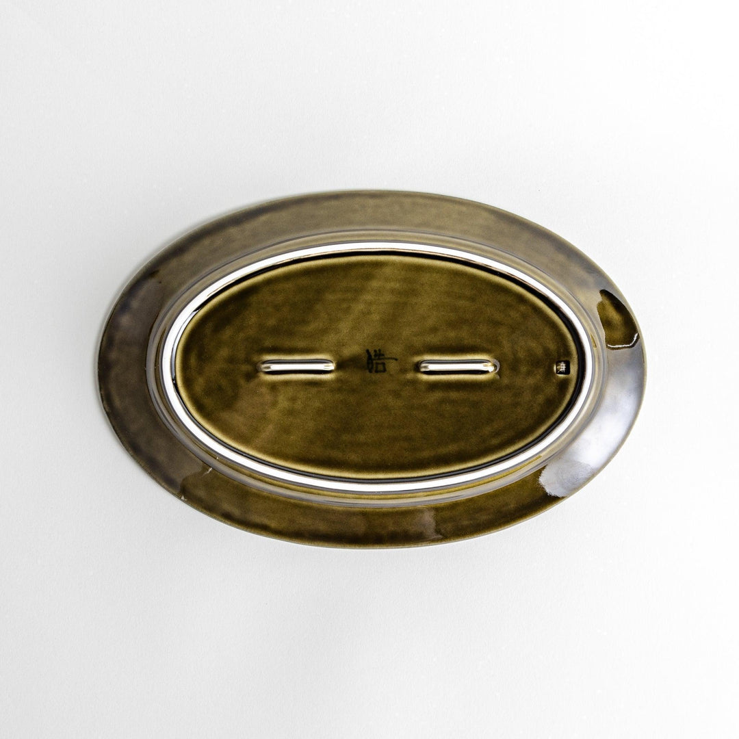 Sleek, dark brown or olive colored oval dinner plate with a glossy finish, simple and minimalist.