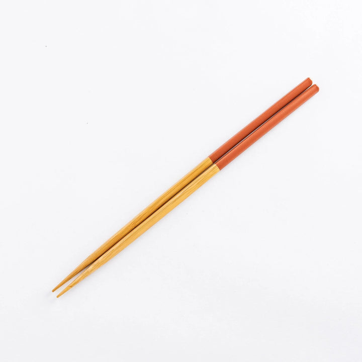 Red tips and bamboo shafts chopsticks. A versatile design perfect for all your cooking needs.