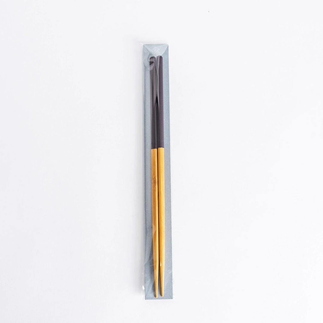 Darkslateblue-tipped cooking chopsticks in transparent packaging.
