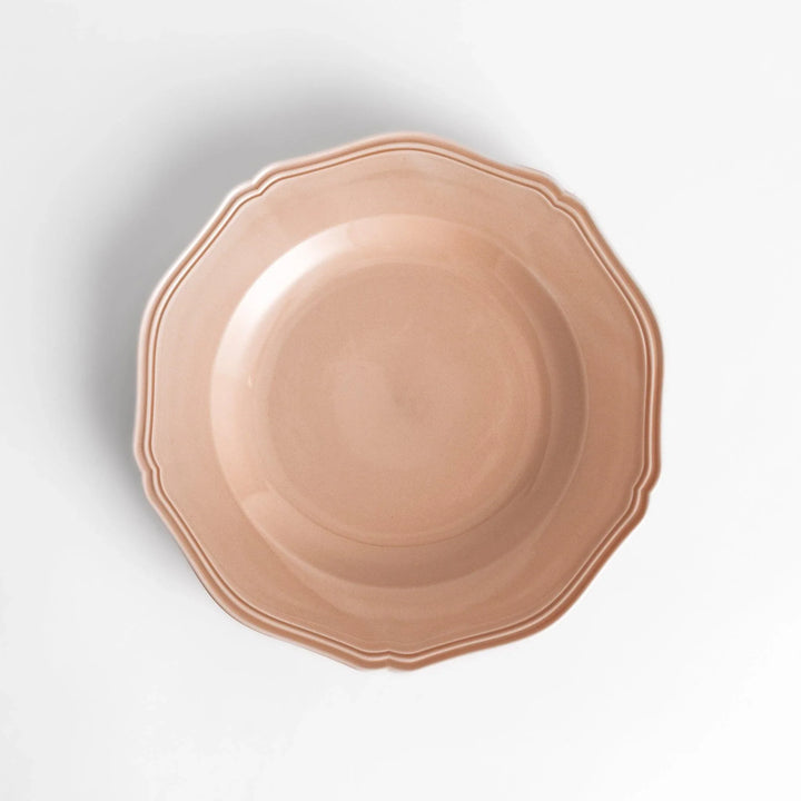 Pretty pink dinner plate with a delicate scalloped edge, ideal for showcasing your culinary creations.