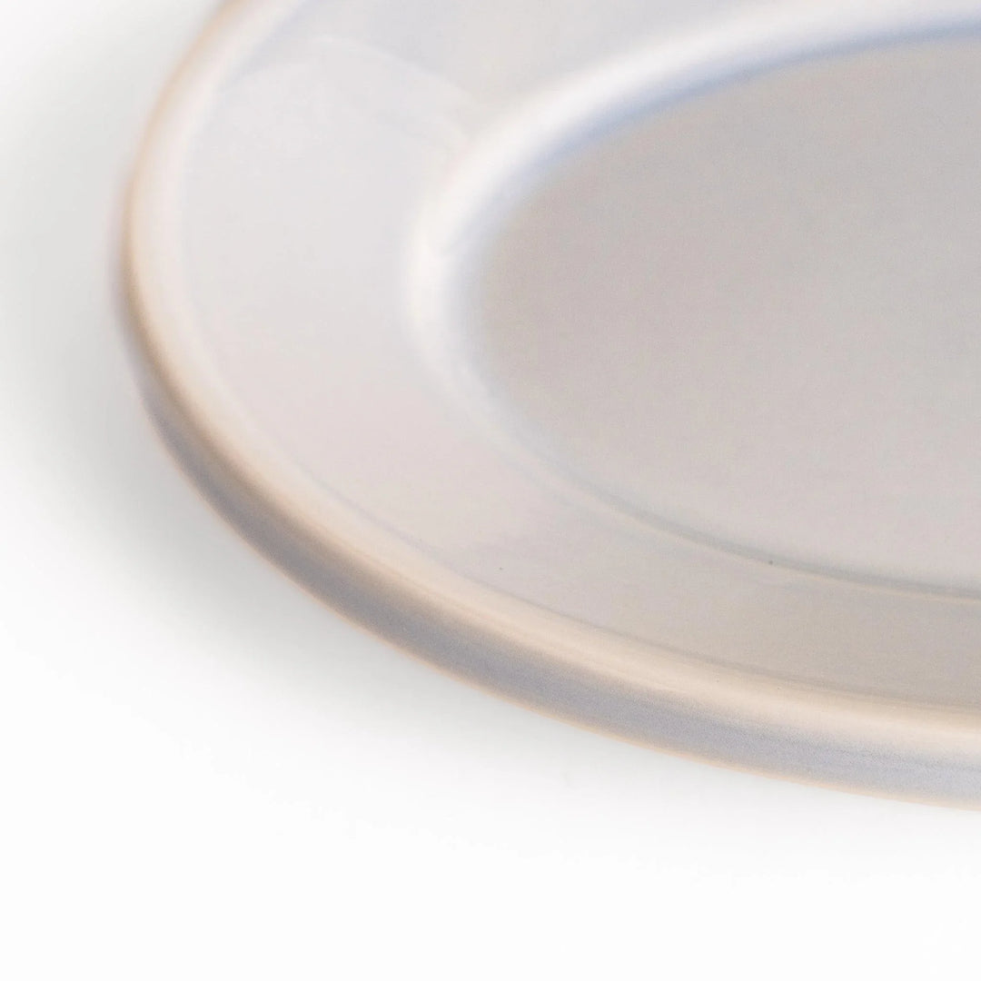 Durable and elegant blue ceramic dessert plate, adding a pop of sunshine to your table setting.