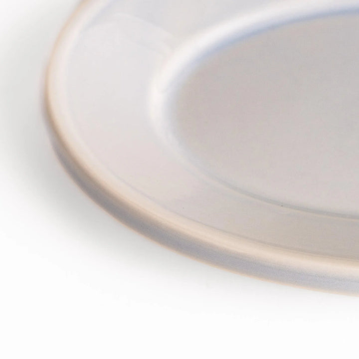 Durable and elegant blue ceramic dessert plate, adding a pop of sunshine to your table setting.