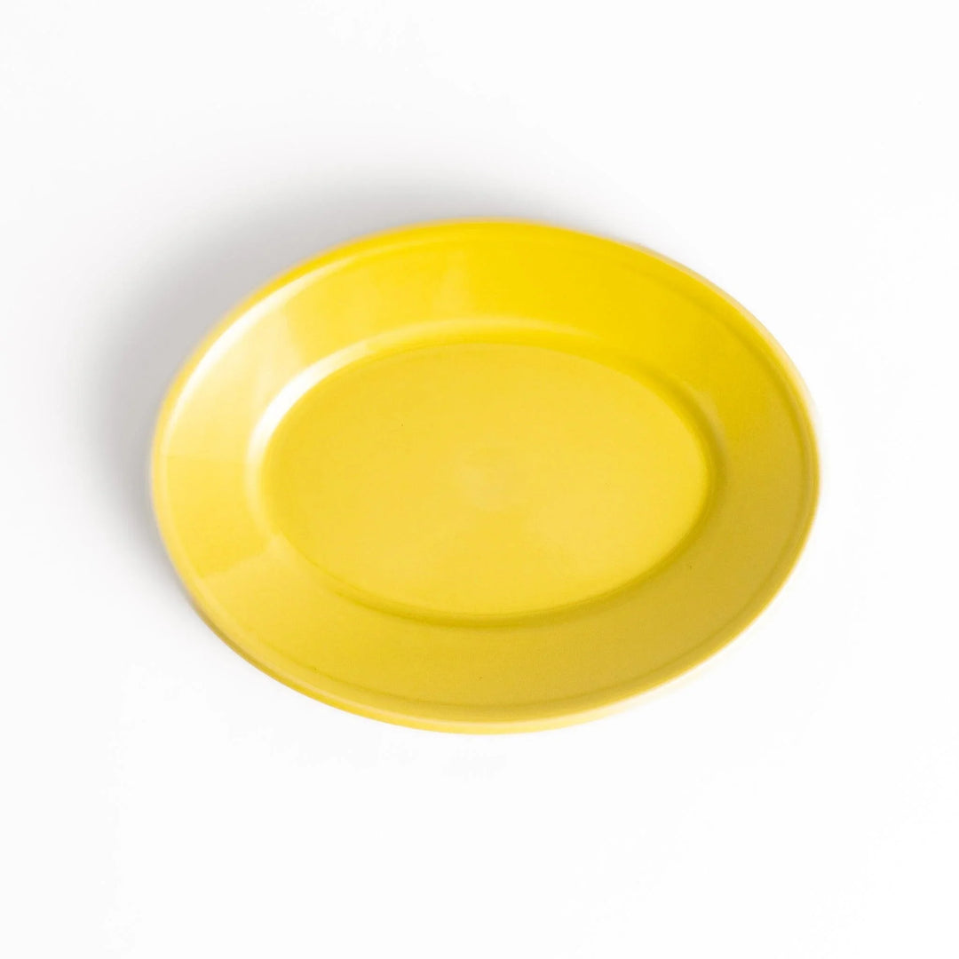Durable and elegant yellow ceramic dessert plate, adding a pop of sunshine to your table setting.