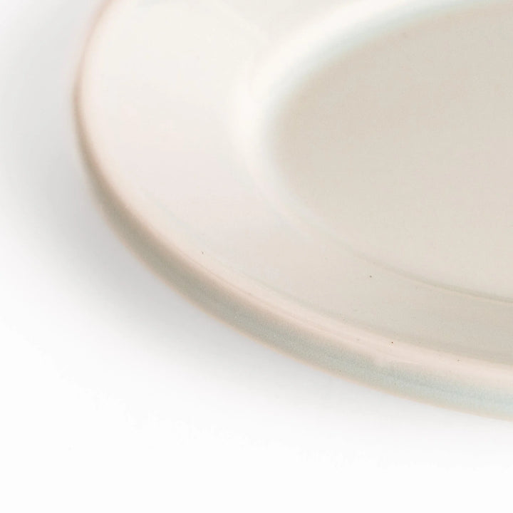 Durable and elegant white ceramic dessert plate, adding a pop of sunshine to your table setting.