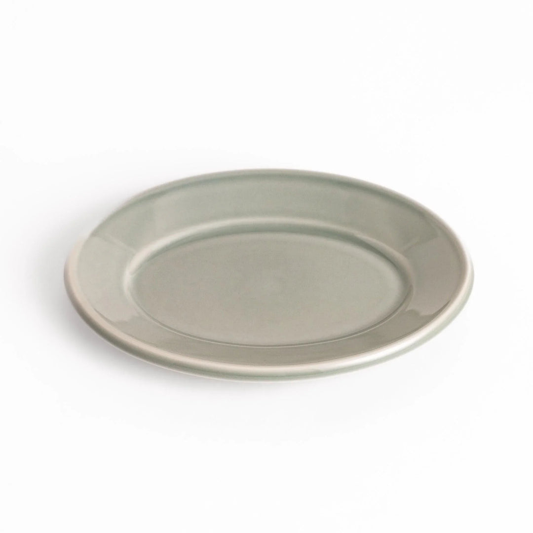 Durable and elegant gray ceramic dessert plate, adding a pop of sunshine to your table setting.