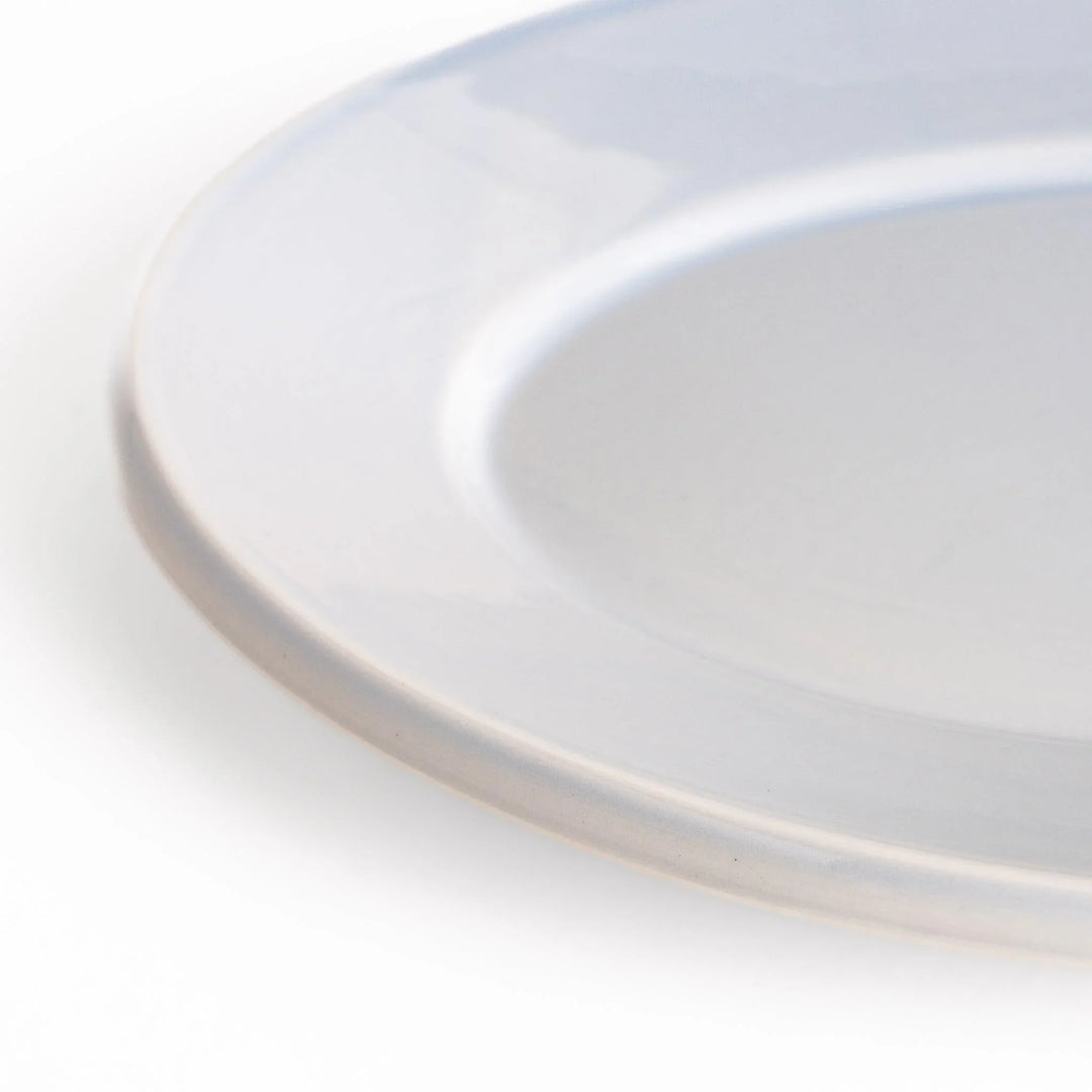 Durable and elegant blue ceramic dinner plate, adding a pop of color to your table setting.