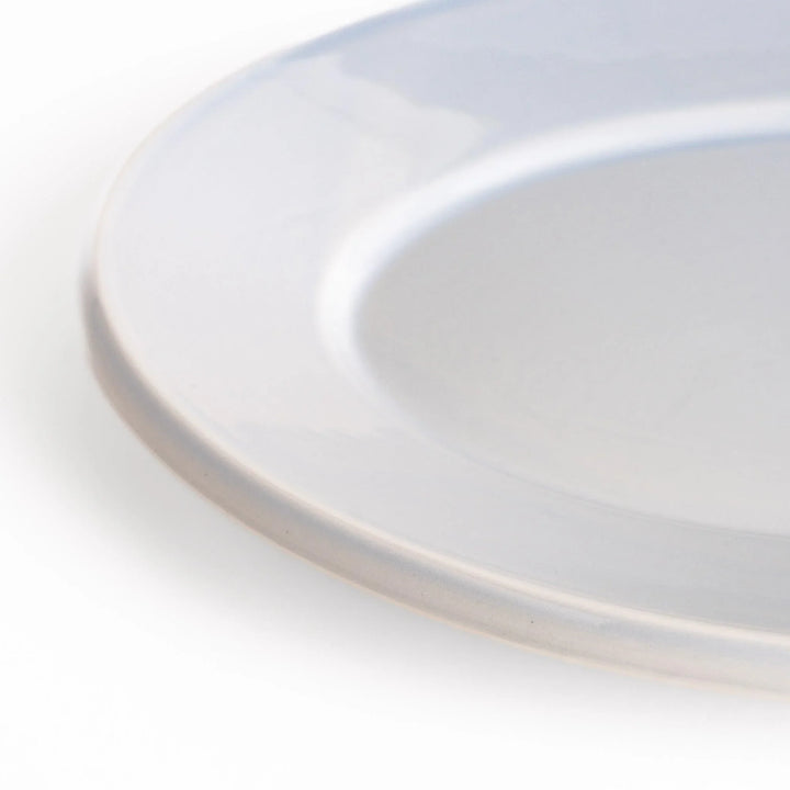 Durable and elegant blue ceramic dinner plate, adding a pop of color to your table setting.