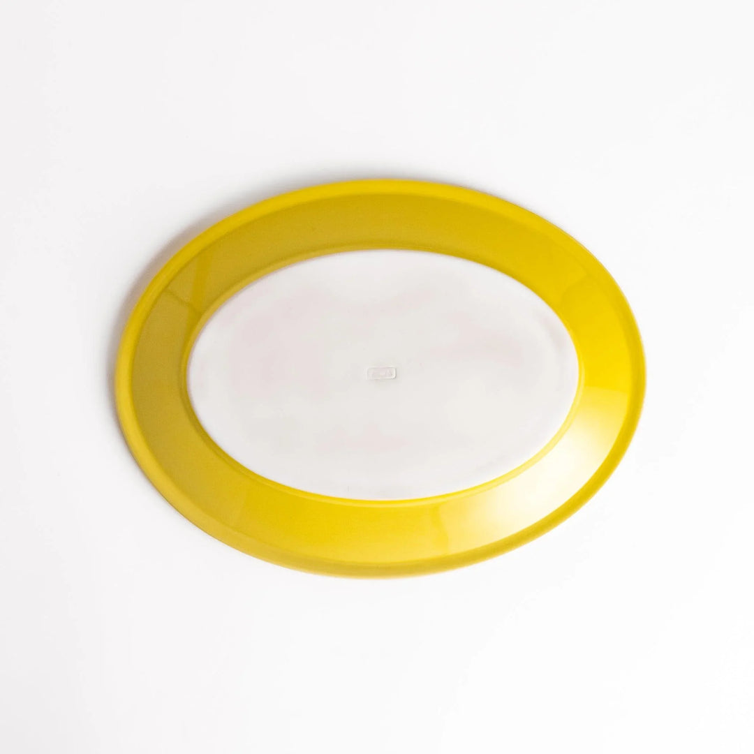 Durable and elegant yellow ceramic dinner plate, adding a pop of color to your table setting.