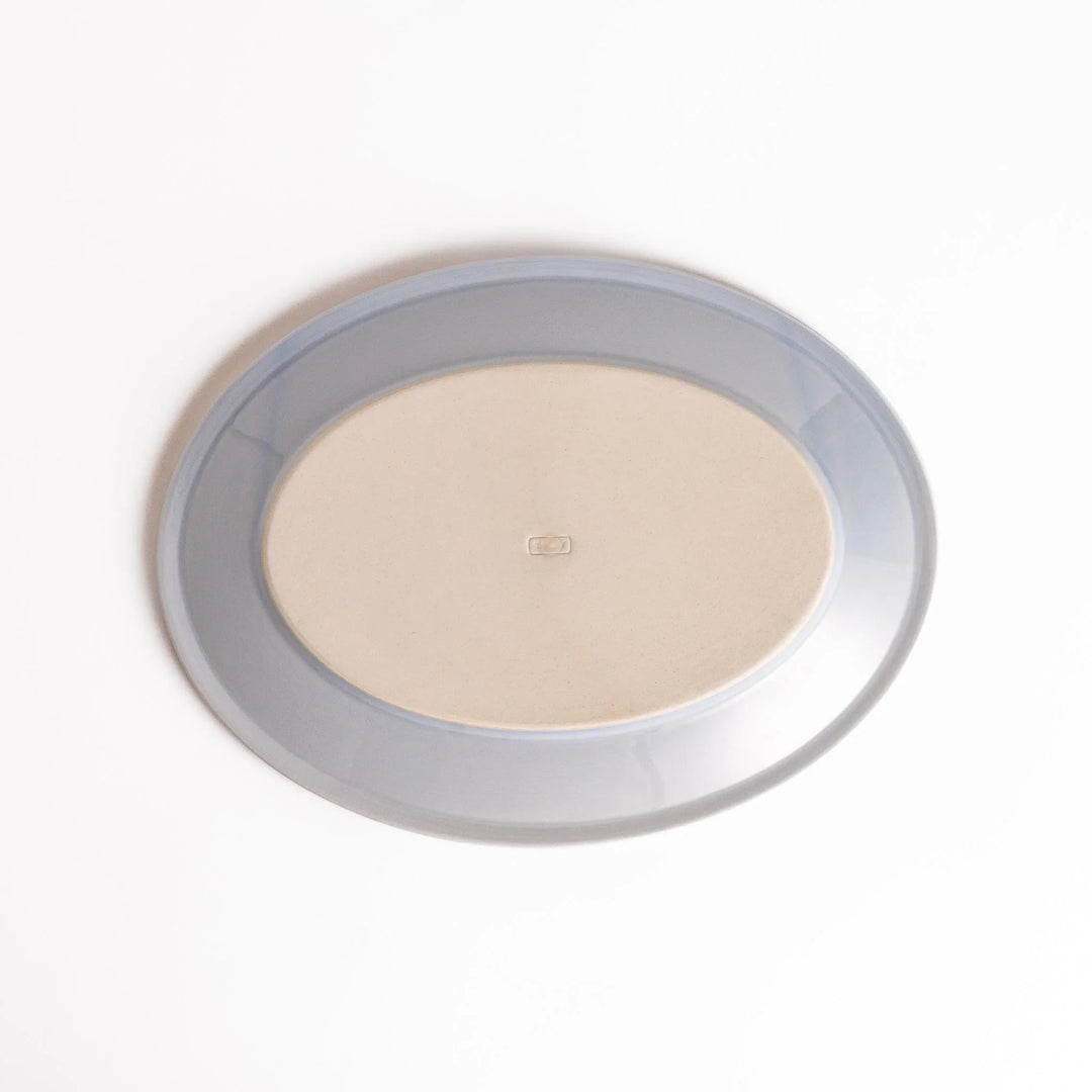 Durable and elegant blue ceramic dinner plate, adding a pop of color to your table setting.