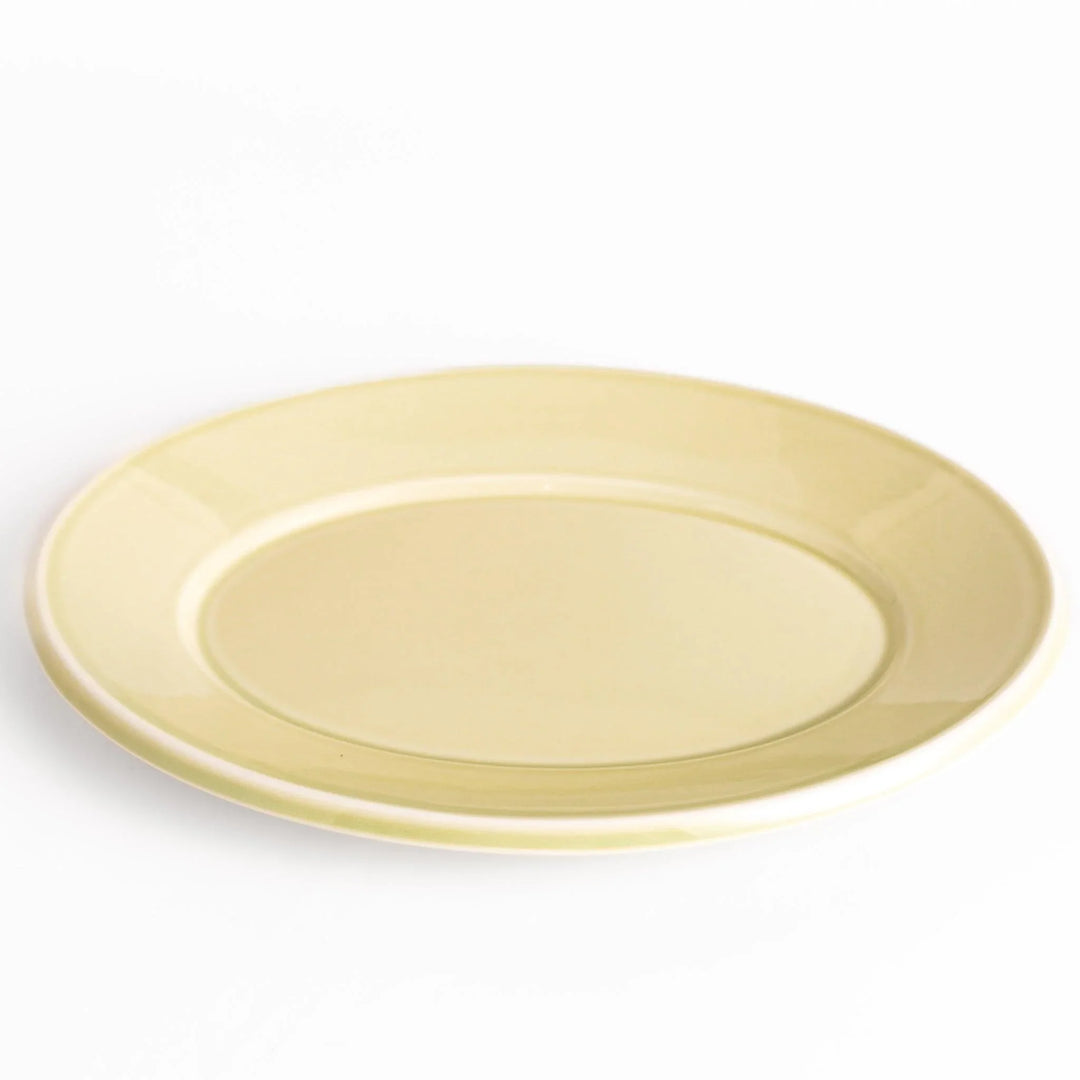 Durable and elegant green ceramic dinner plate, adding a pop of color to your table setting.