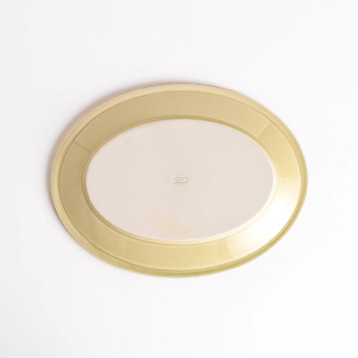 Durable and elegant green ceramic dinner plate, adding a pop of color to your table setting.