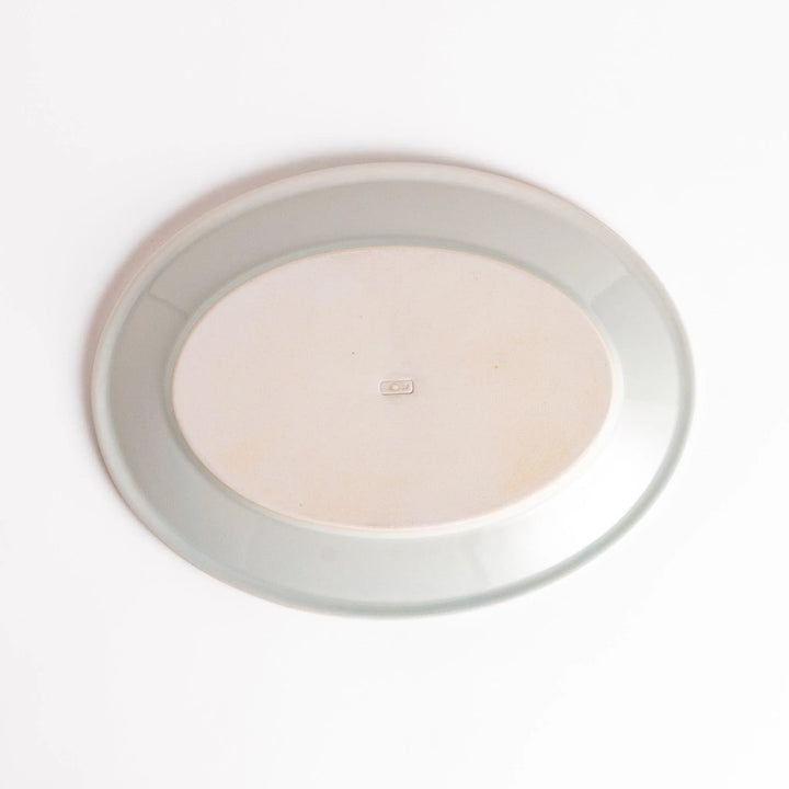 Durable and elegant white ceramic dinner plate, adding a pop of color to your table setting.