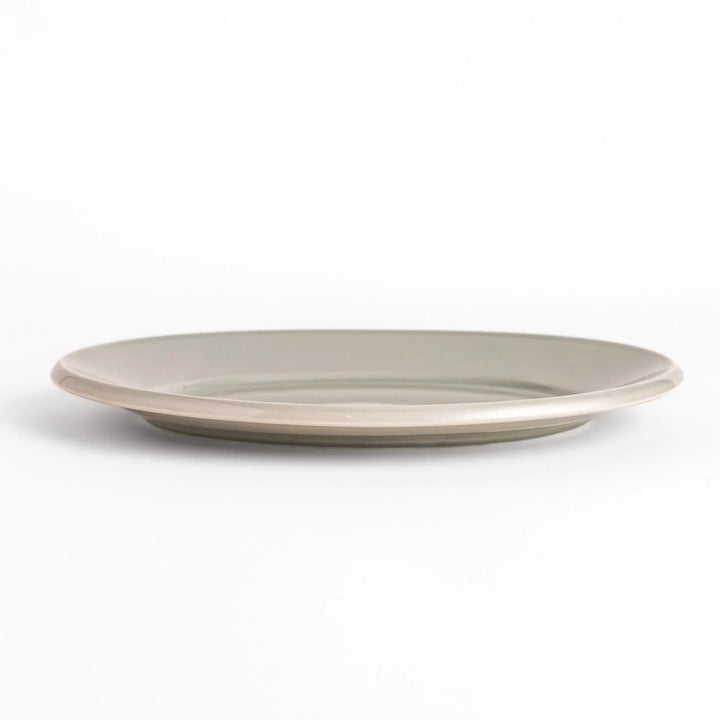 Durable and elegant gray ceramic dinner plate, adding a pop of color to your table setting.