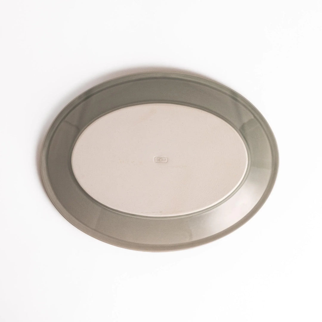 Durable and elegant gray ceramic dinner plate, adding a pop of color to your table setting.