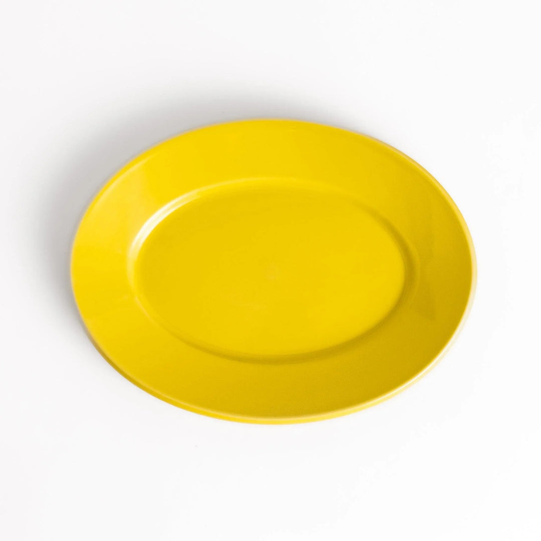 Durable and elegant yellow ceramic salad plate, adding a pop of color to your table setting.