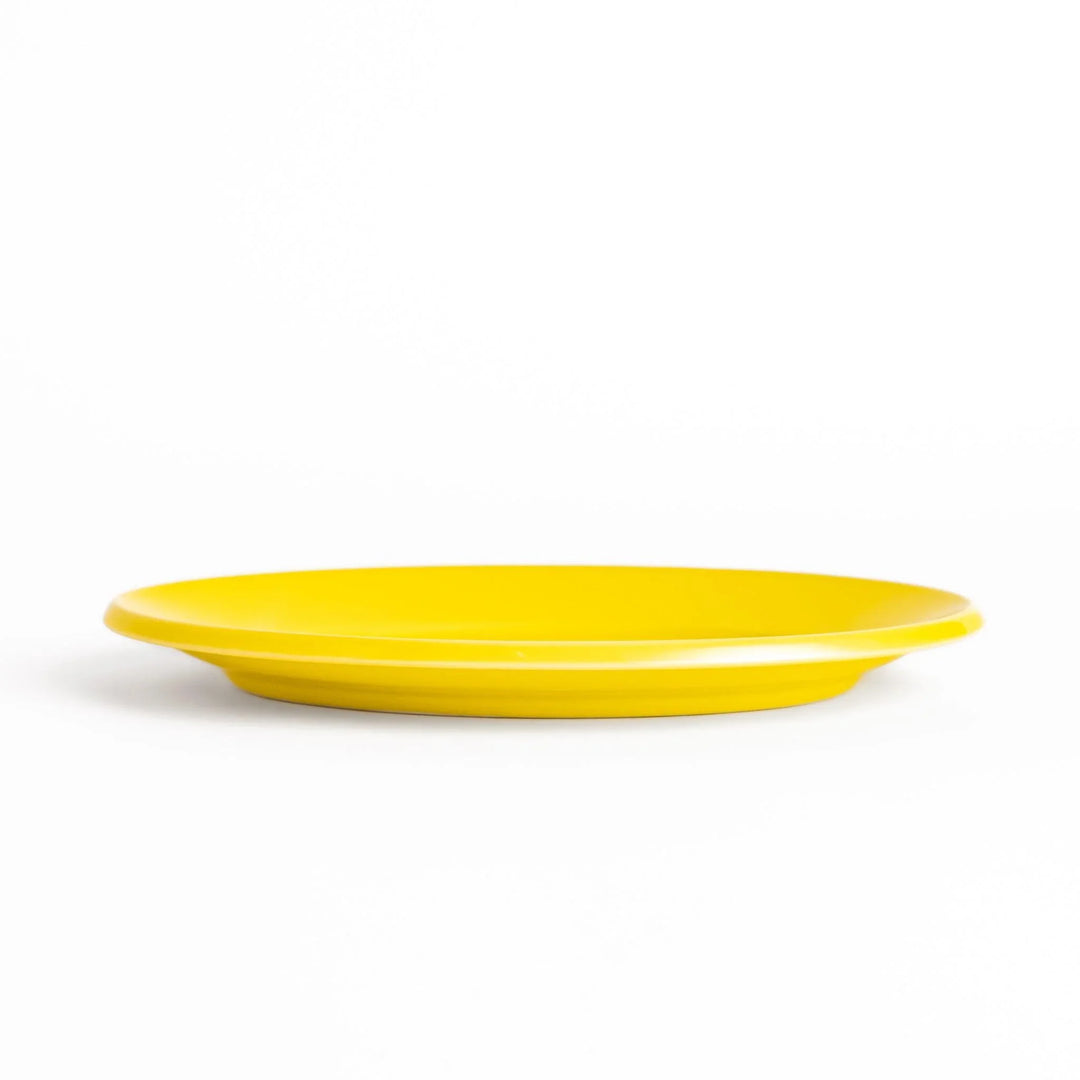 Durable and elegant yellow ceramic salad plate, adding a pop of color to your table setting.