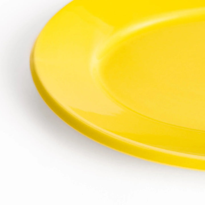 Durable and elegant yellow ceramic salad plate, adding a pop of color to your table setting.