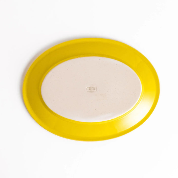 Durable and elegant yellow ceramic salad plate, adding a pop of color to your table setting.