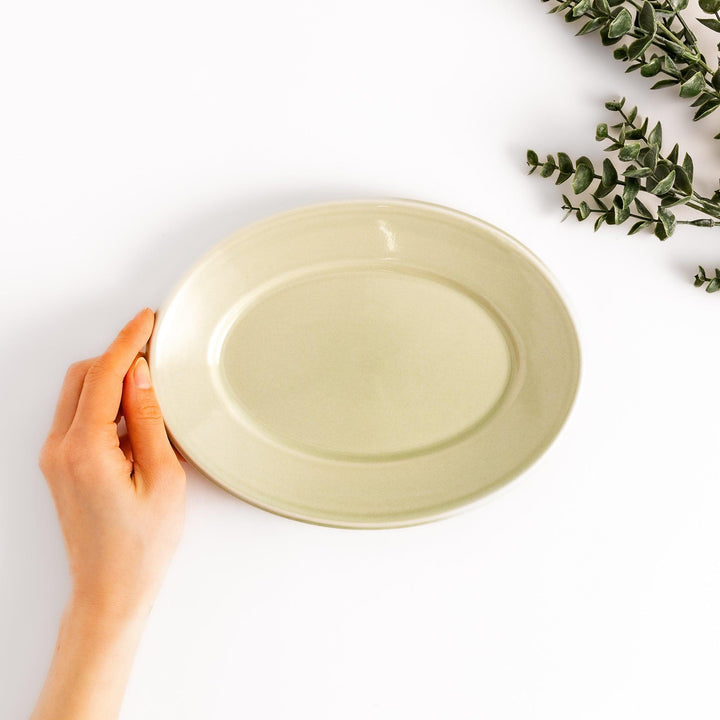 Durable and elegant green ceramic salad plate, adding a pop of color to your table setting.