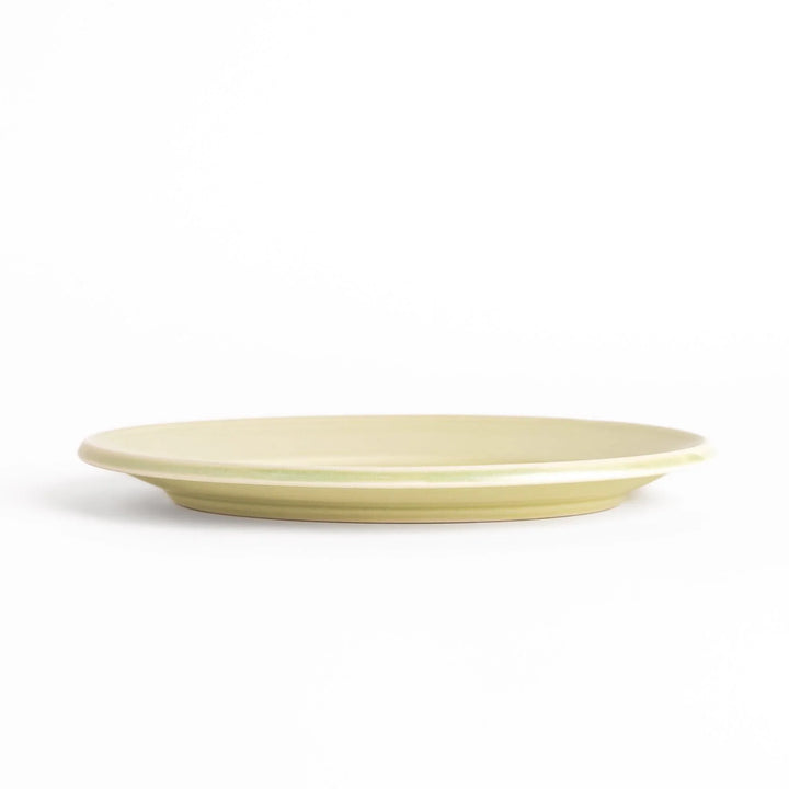 Durable and elegant green ceramic salad plate, adding a pop of color to your table setting.