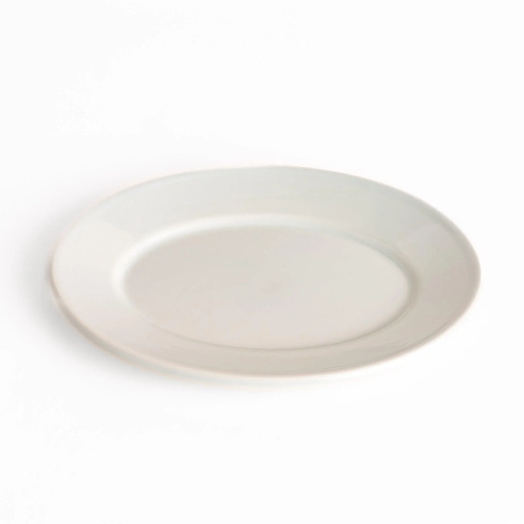 Durable and elegant white ceramic salad plate, adding a pop of color to your table setting.