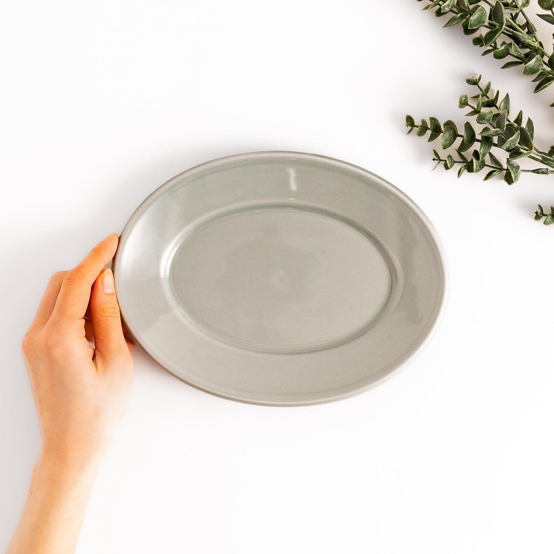 Durable and elegant gray ceramic salad plate, adding a pop of color to your table setting.