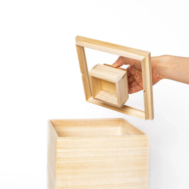 Square paulownia wood rice box with a minimalist design and wooden lid, ideal for stylish and functional storage.