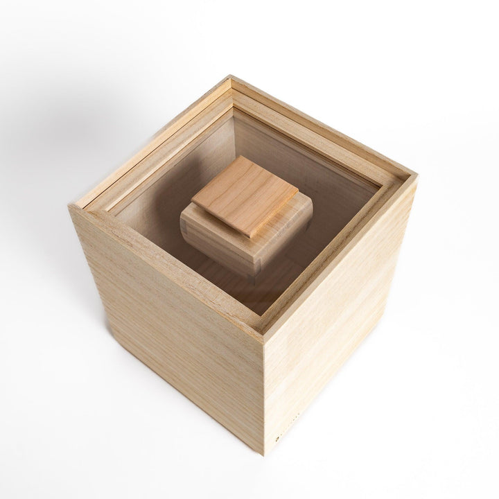 Square paulownia wood rice box with a minimalist design and wooden lid, ideal for stylish and functional storage.