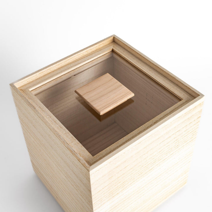 Square paulownia wood rice box with a minimalist design and wooden lid, ideal for stylish and functional storage.
