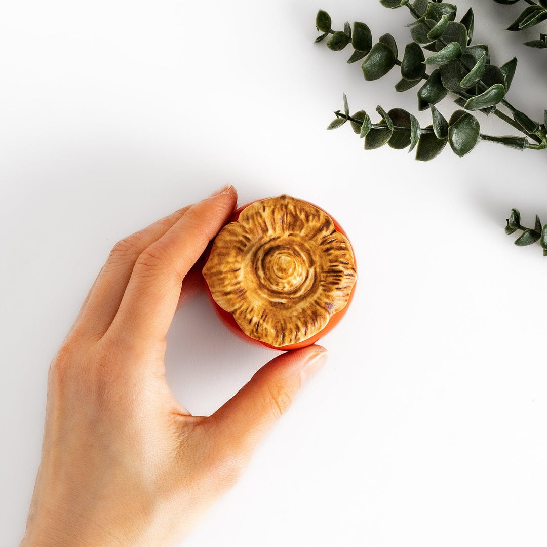 Green apple shaped ceramic condiment bowl with glossy finish and lid perfect for sauces or condiments.