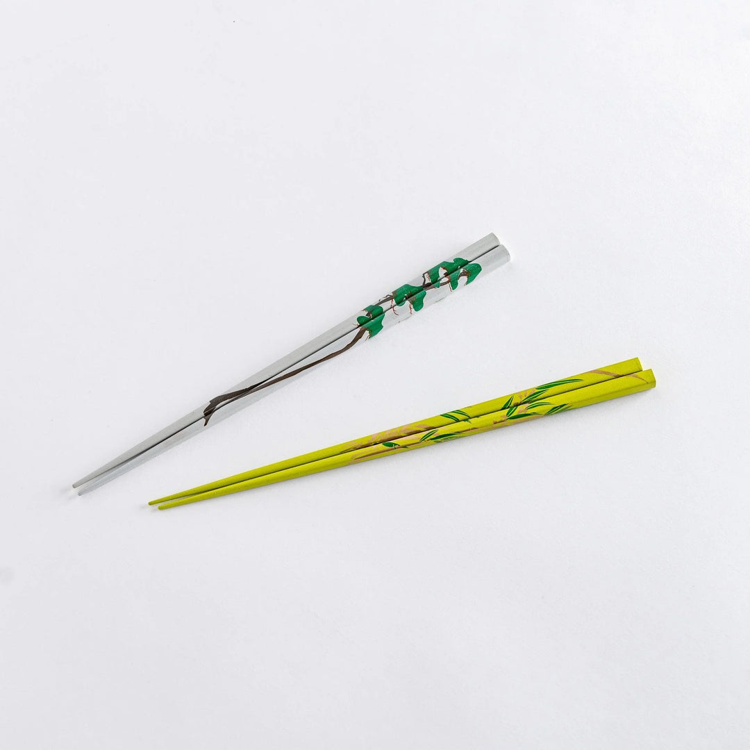 Chopsticks with traditional pine and bamboo patterns arranged side by side, reflecting elegant and timeless craftsmanship.