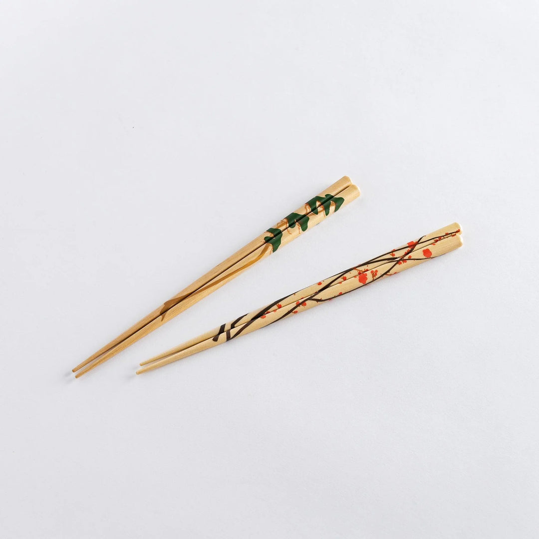 Two elegant chopstick rests with a translucent finish, featuring delicate swirls of beige and white patterns.