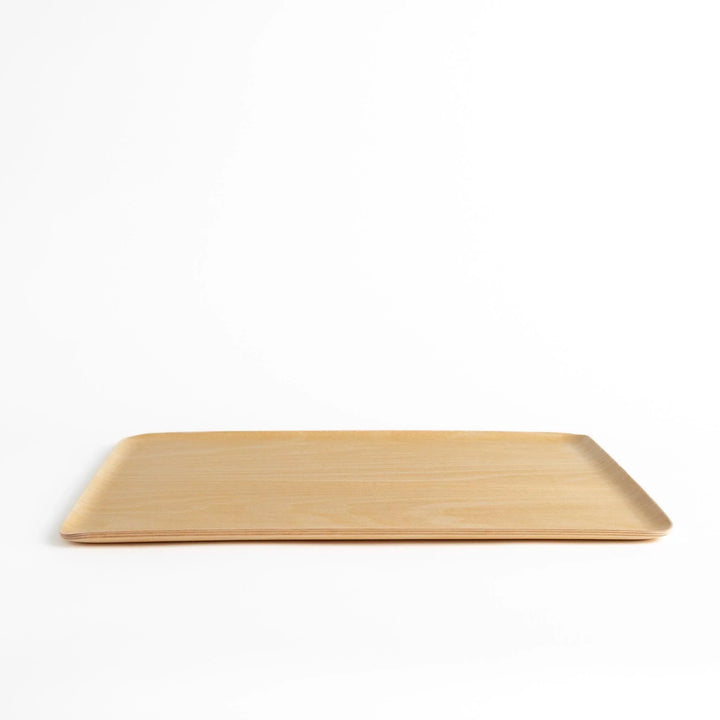 Light brown wooden serving tray with minimalist design perfect for serving meals snacks or drinks.