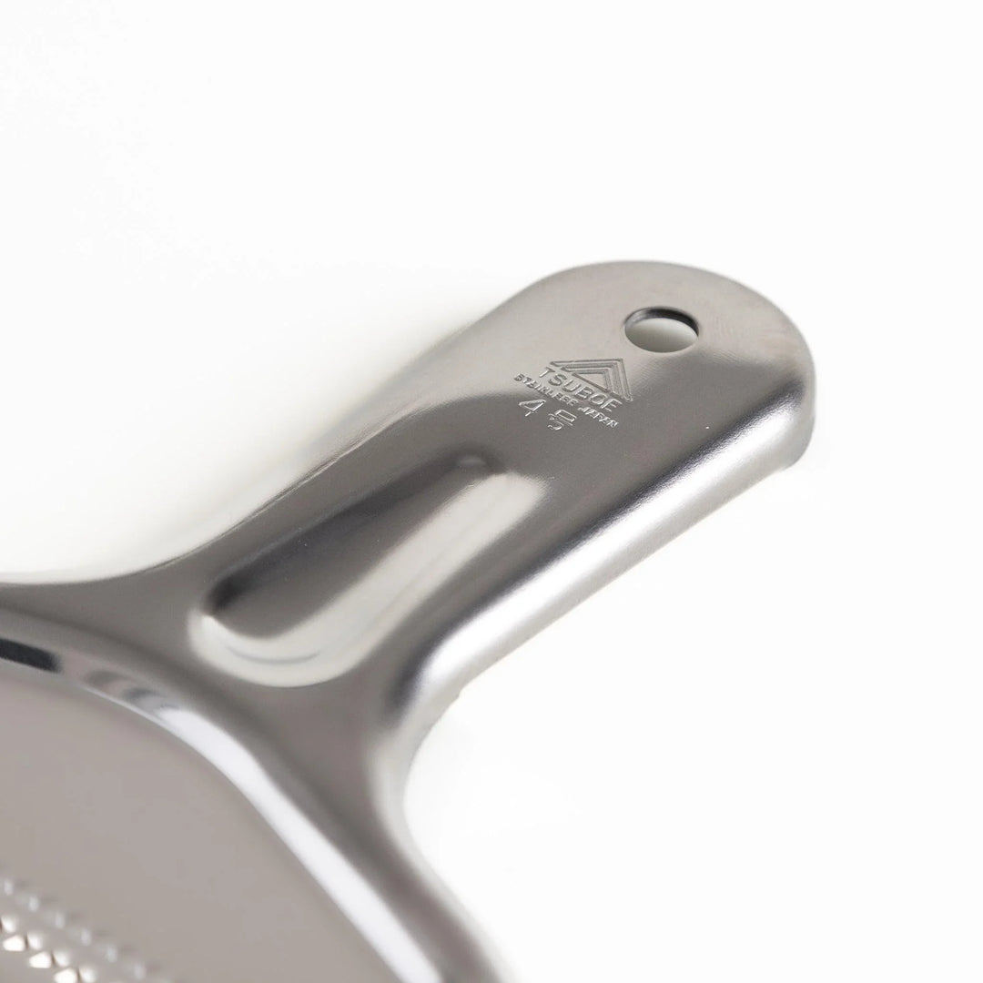 Stainless steel miso strainer with fine mesh and long handle perfect for making smooth miso soup.