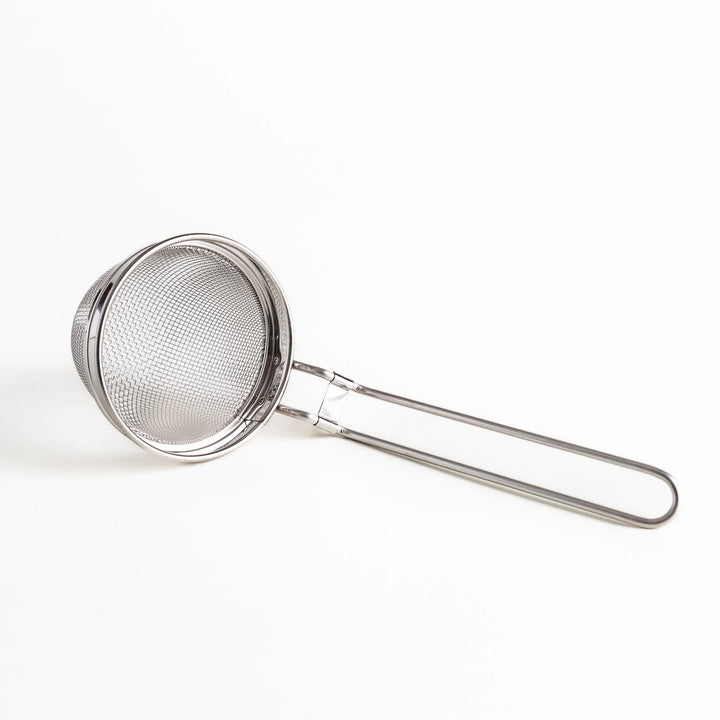 Stainless steel miso strainer with fine mesh and long handle perfect for making smooth miso soup.